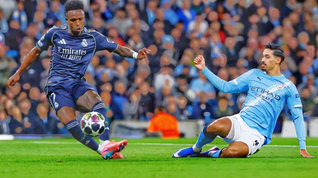 ভিনিসিয়াসের জোড়া গোলে ম্যানসিটিকে বিদায় করল রিয়াল